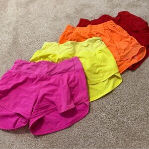 lululemon athletica Women's Athletic Shorts in Pink, Yellow, Orange, and Red.